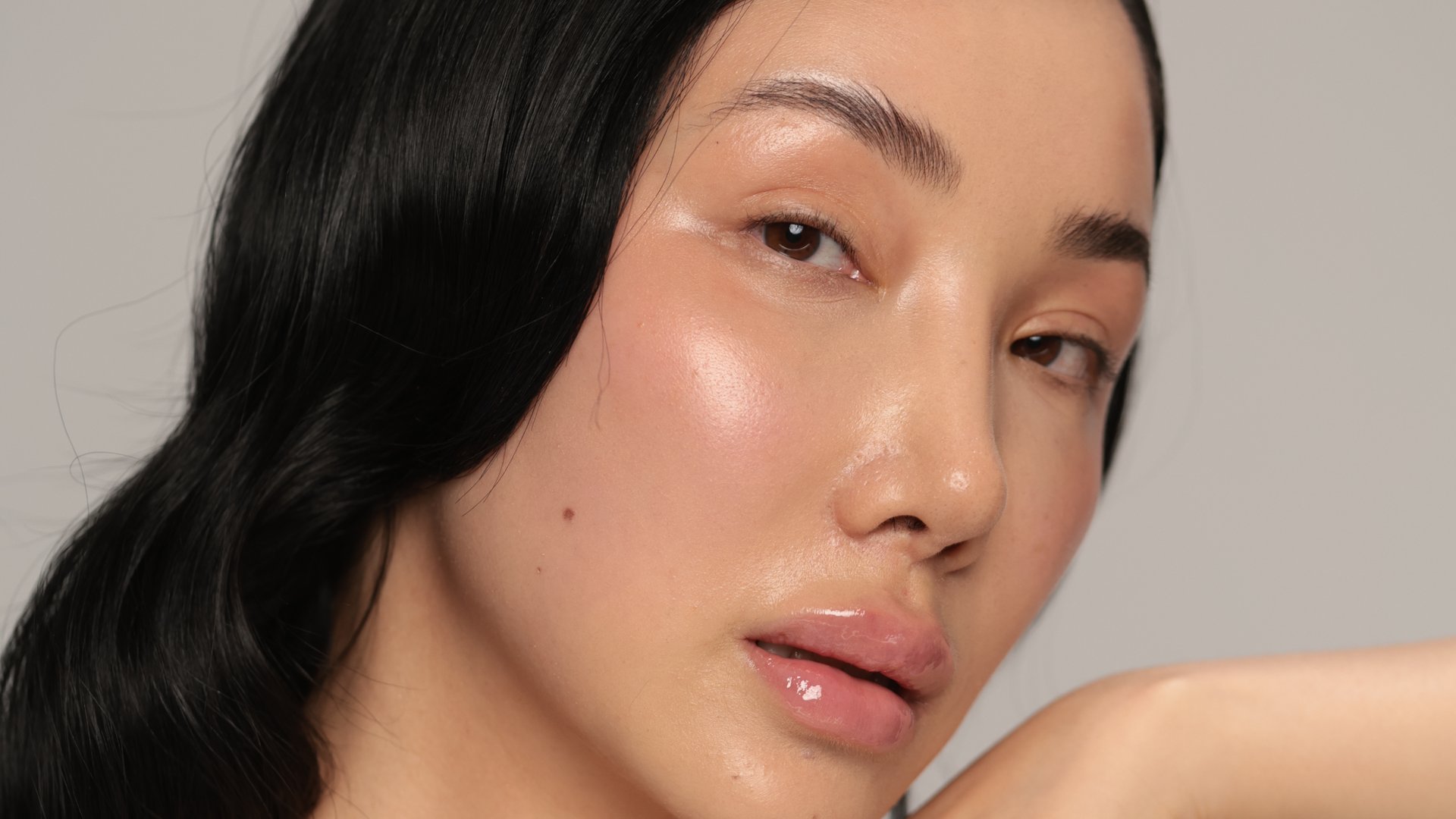 Smooth, even-toned decolletage and shoulders, the areas most often missed by sunscreen.